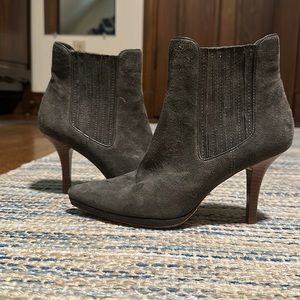 Cole Haan grey suede boots with brown stacked leather looking high heel.